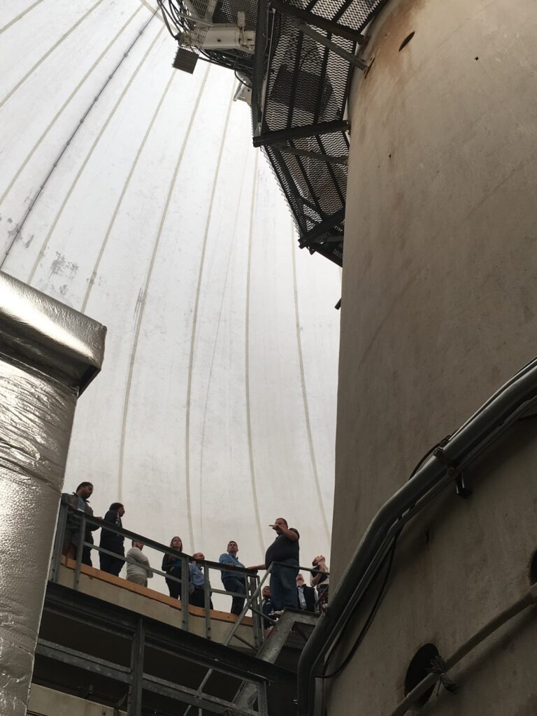 People inside the Westford Radio Telescope for a tour